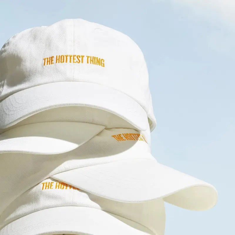 White Adjustable Badalada Baseball Cap - source design and use details