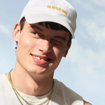 White Adjustable Badalada Baseball Cap - source design and use details